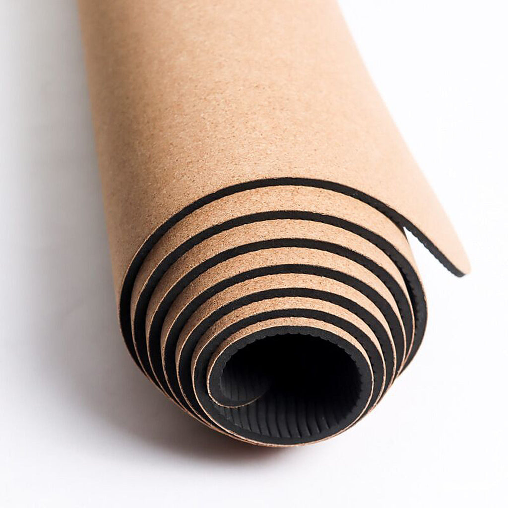Lavafor Cork Mat rolled, showing cork top and black base